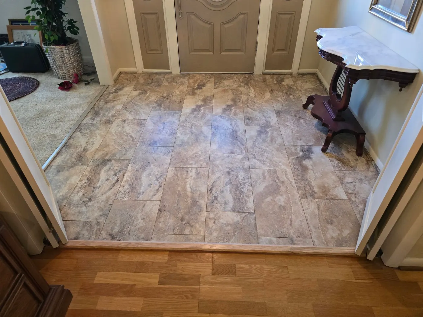 Tile entryway, laid clean and level by BuildRight Home Improvement