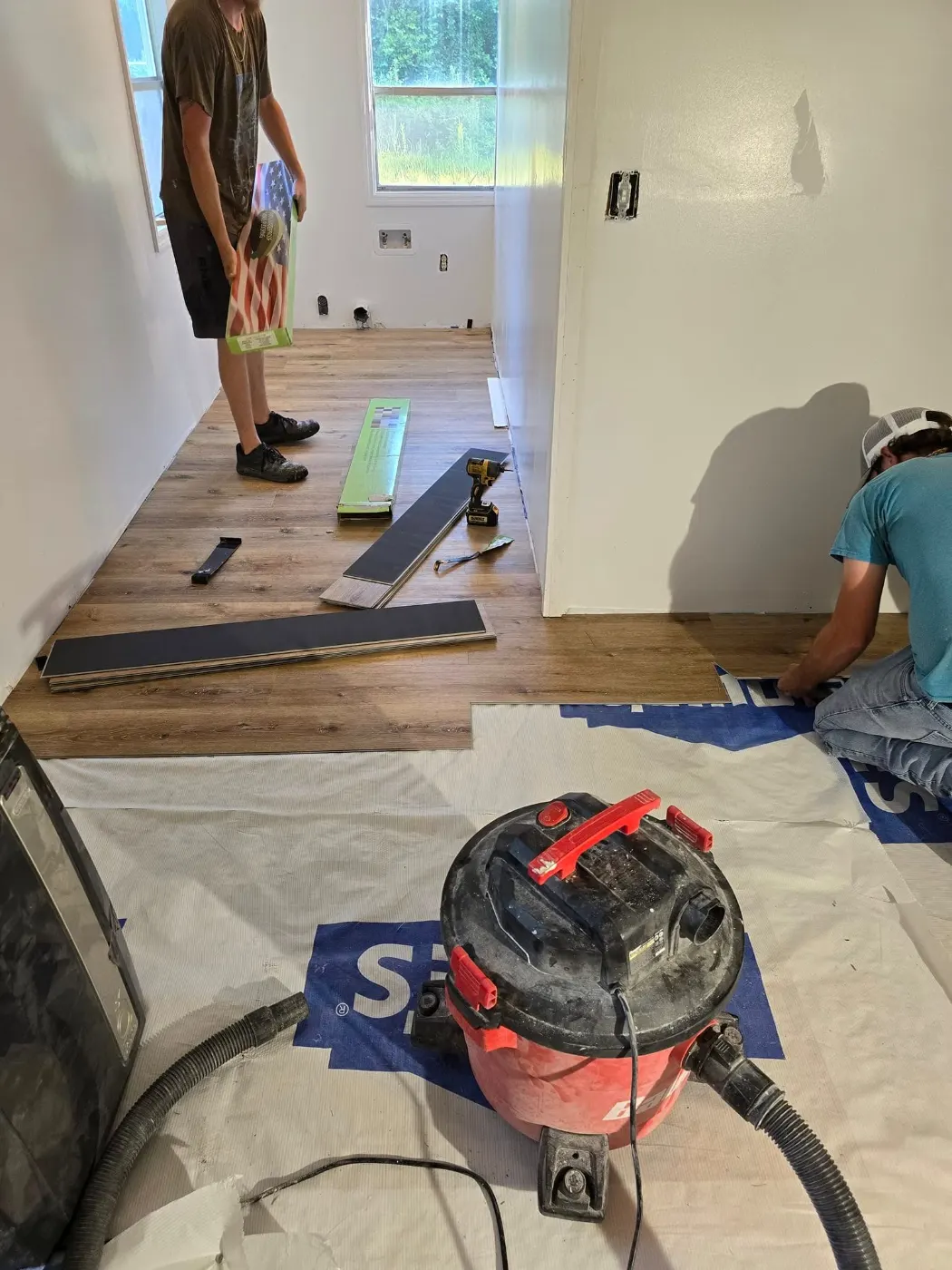 New floors going down by BuildRight Home Improvement