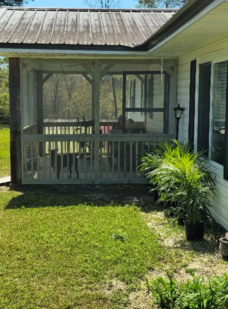 Screened porch, rebuilt and painted by BuildRight Home Improvement