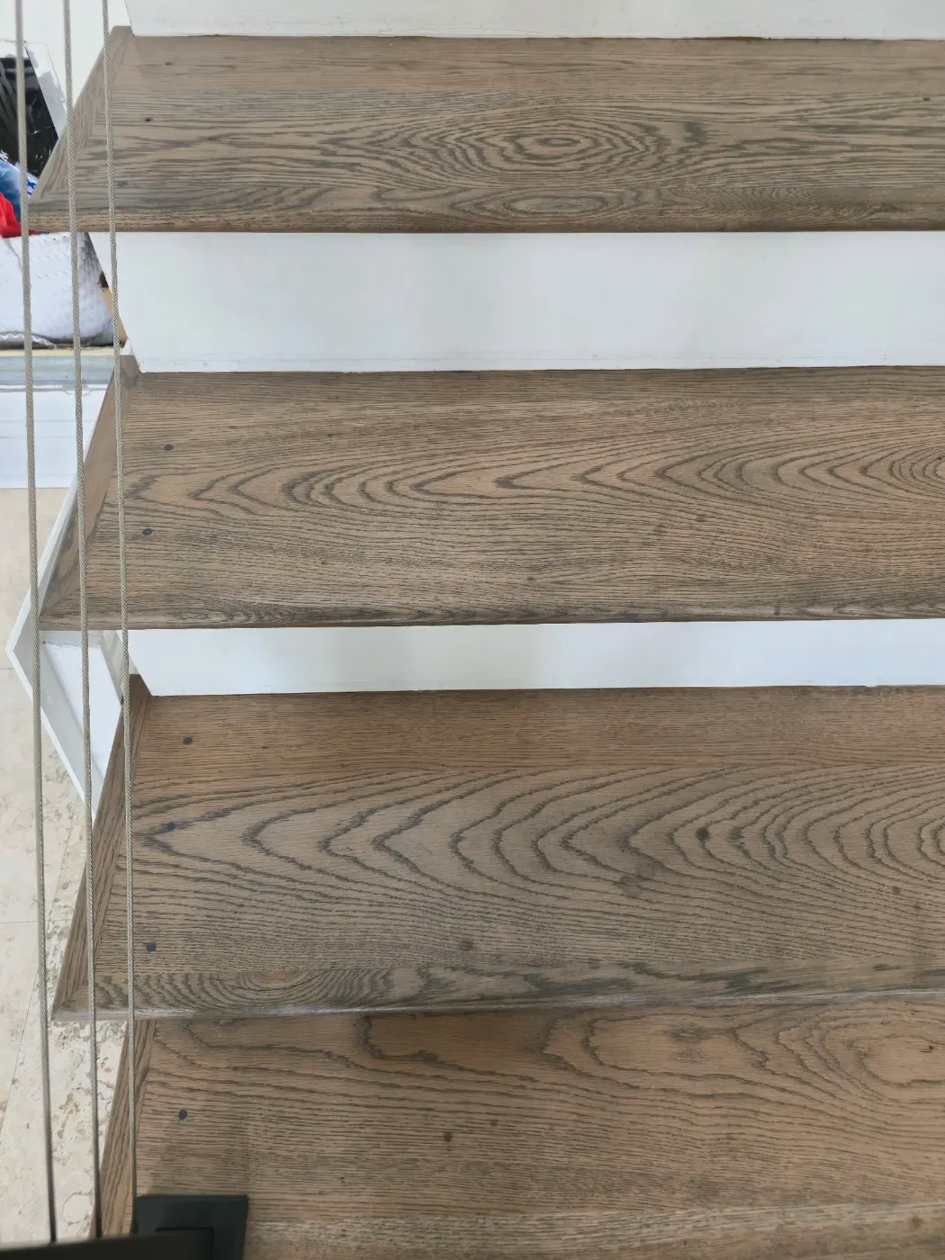 Stair treads, refinished by BuildRight Home Improvement