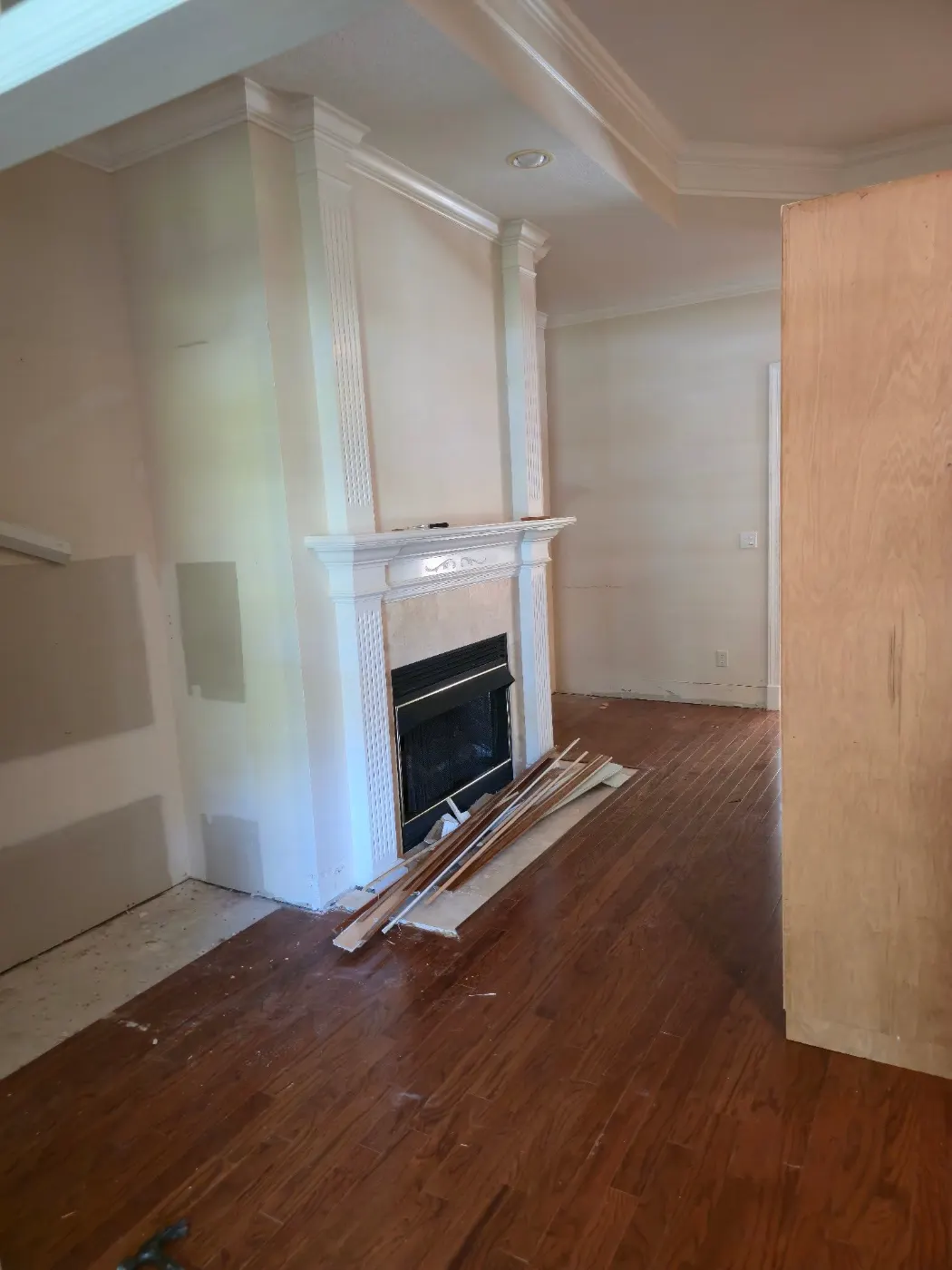 Fireplace wall, finished and painted by BuildRight Home Improvement