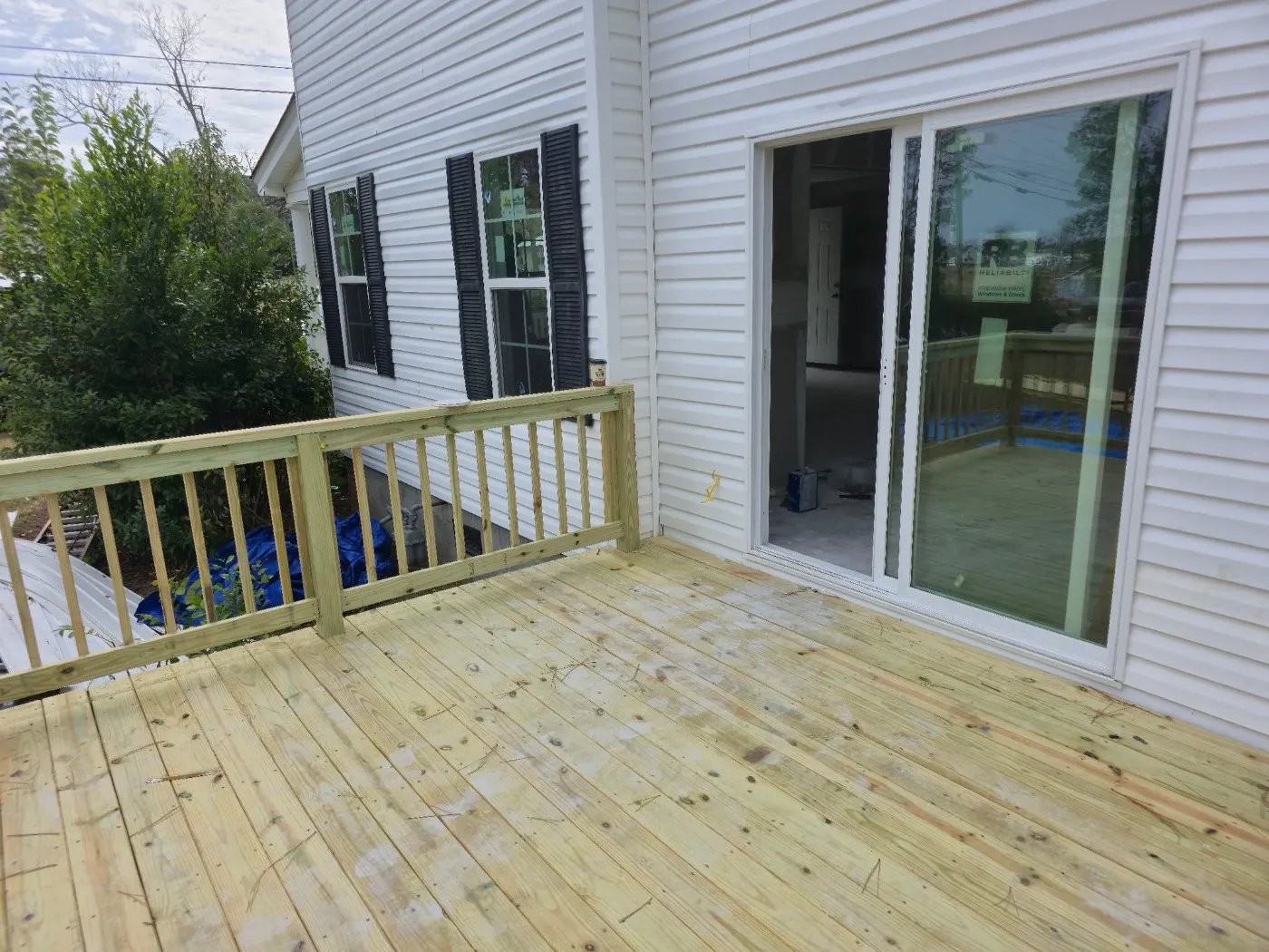 New deck off the sliding door by BuildRight Home Improvement