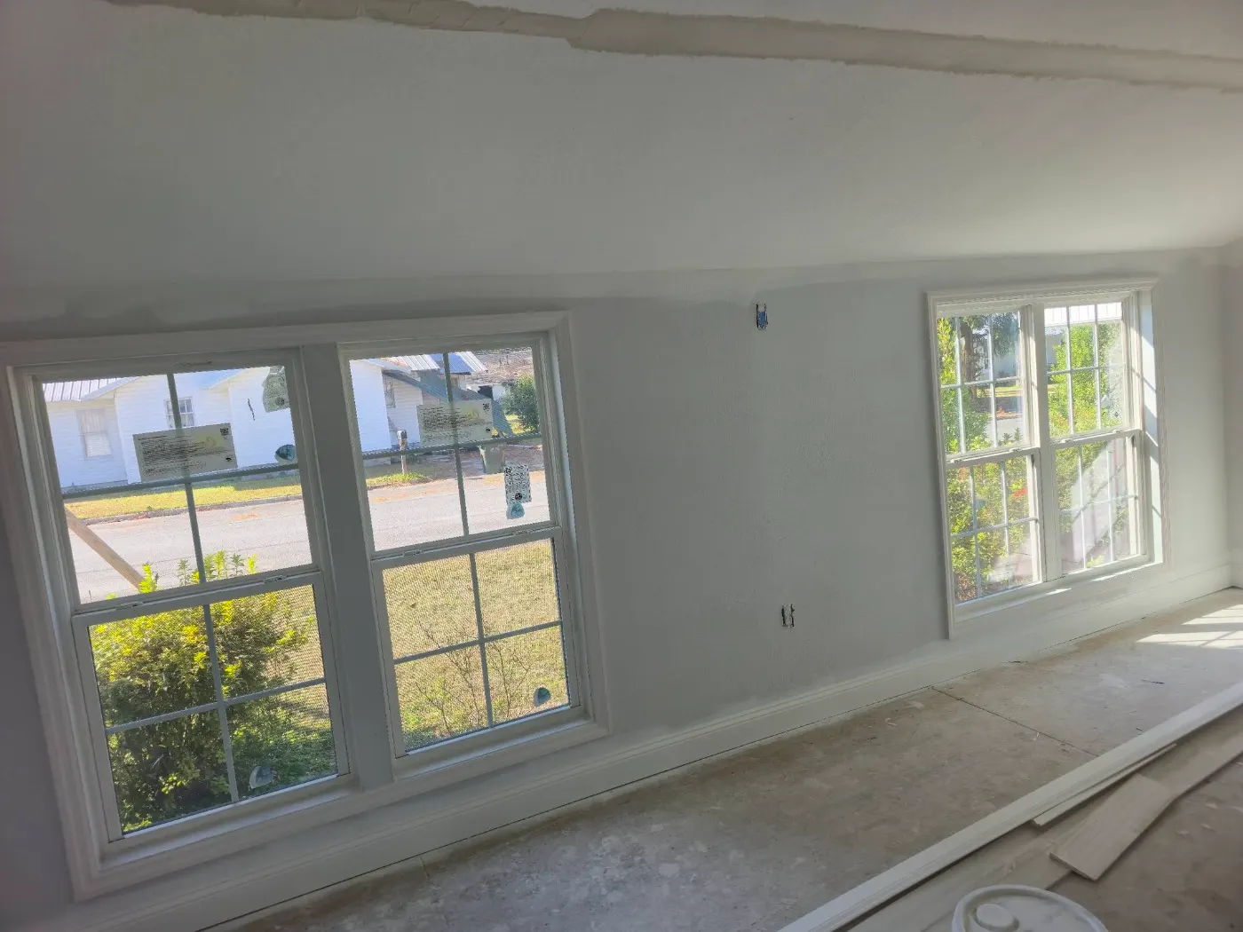 Living room with new windows by BuildRight Home Improvement